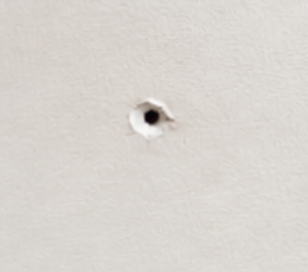 Small hole in wall